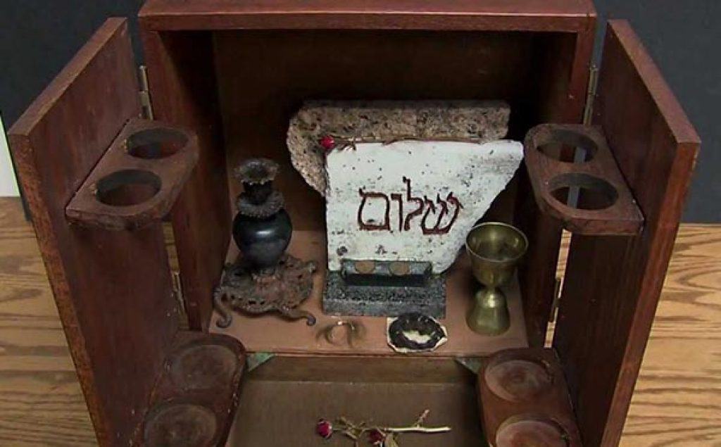 The contents of the open Dibbuk Box. eBay photo.